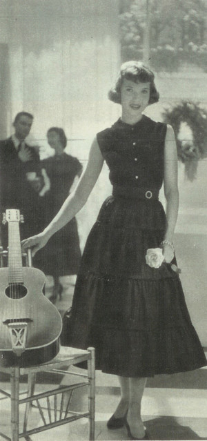 In this photo from a fashion feature, the guitar is a prop.  Girls were rarely shown playing, or even touching, guitars in Seventeen in the 1940s and ‘50s (Seventeen Dec 1949)